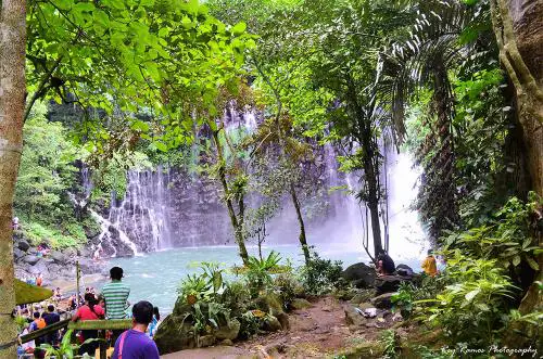 Visitors at Tinago Falls.